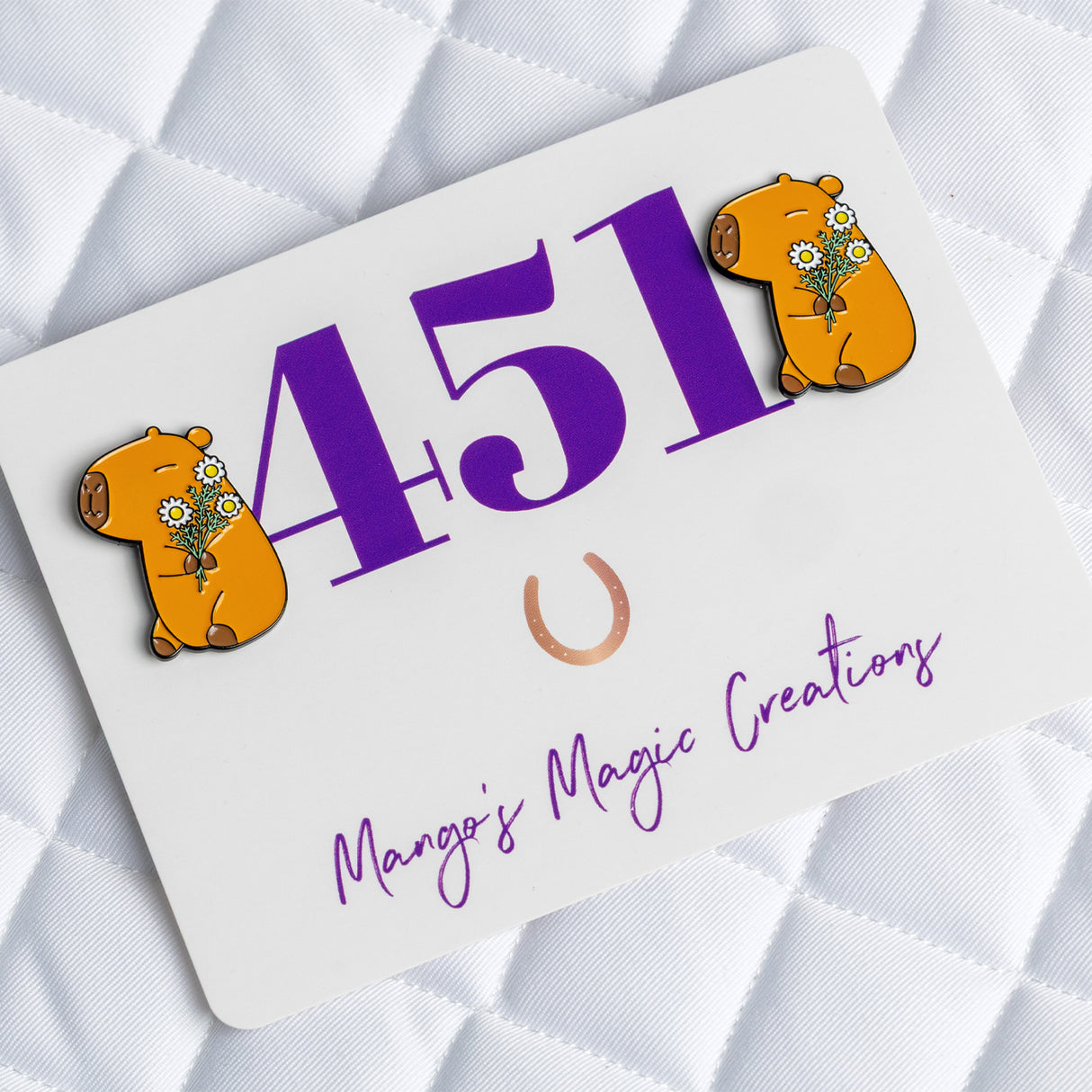 Épingles numérotées Mango's Magic Capybara