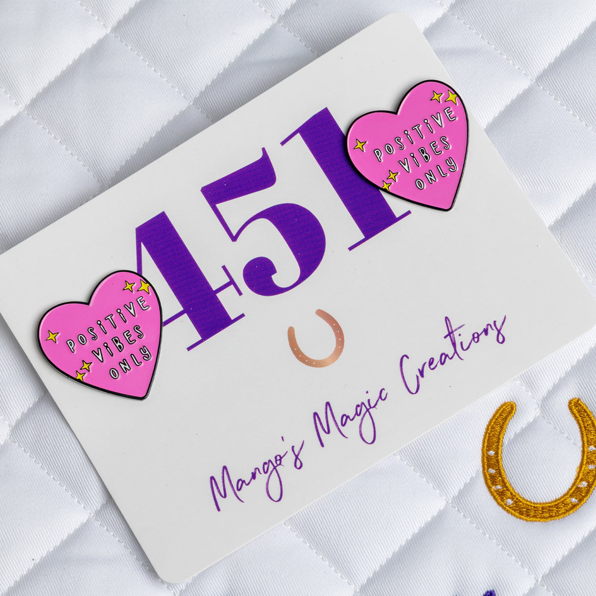 Les épingles à chiffres magiques et positives de Mango